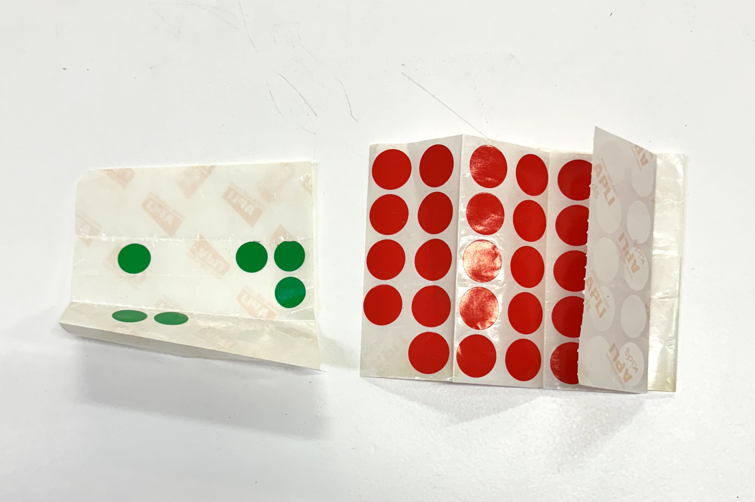 some red and green dot stickers